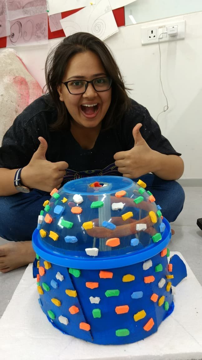 Vedika giving two thumbs up